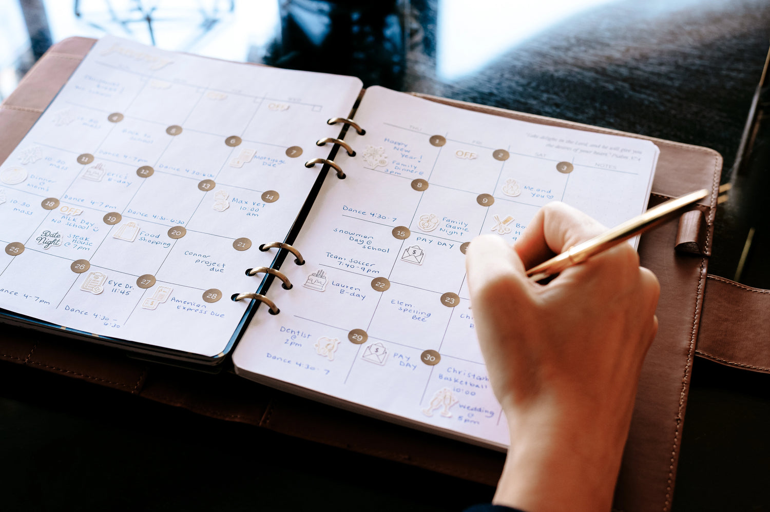 Monthly calendar spread inside the Honor Him Christian marriage planner, designed to help wives organize family schedules, daily priorities, and intentional moments of connection.