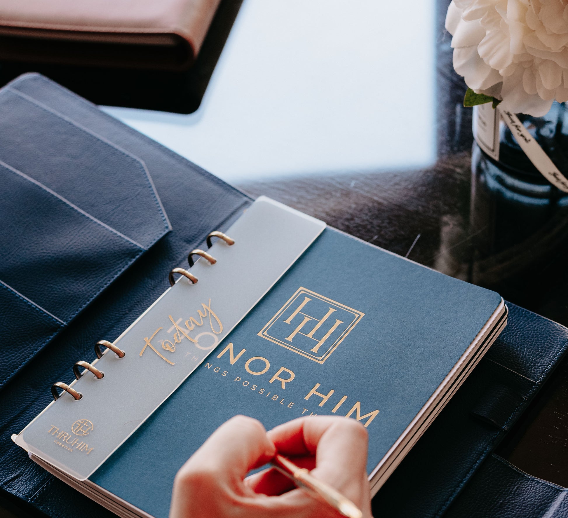 Honor Him Luxe Marriage Transformation System Navy Edition on a table 