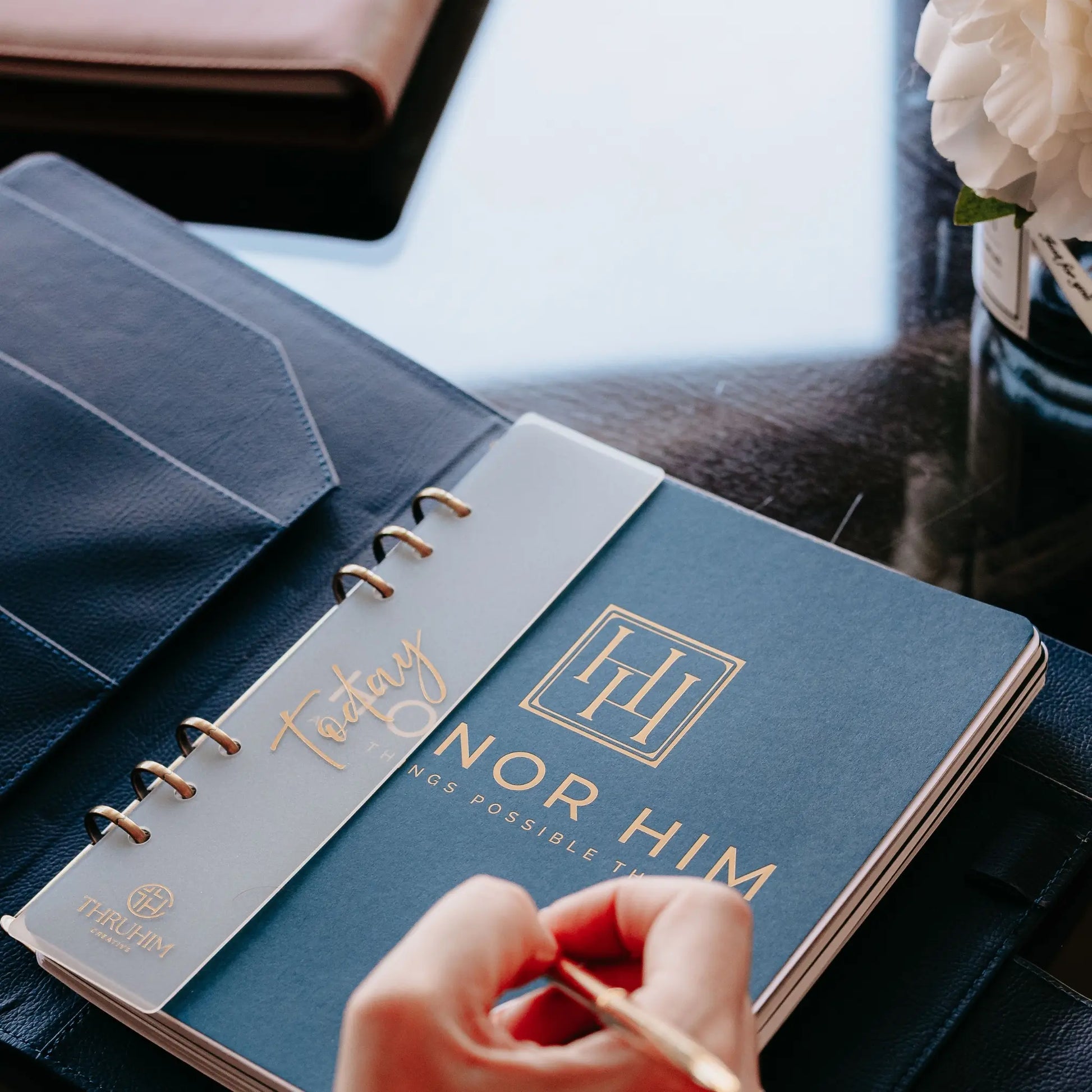 Honor Him Luxe Marriage Transformation System Navy Edition featuring a premium Christian marriage planner, leather padfolio, and bookmark designed to strengthen connection through intentional daily habits