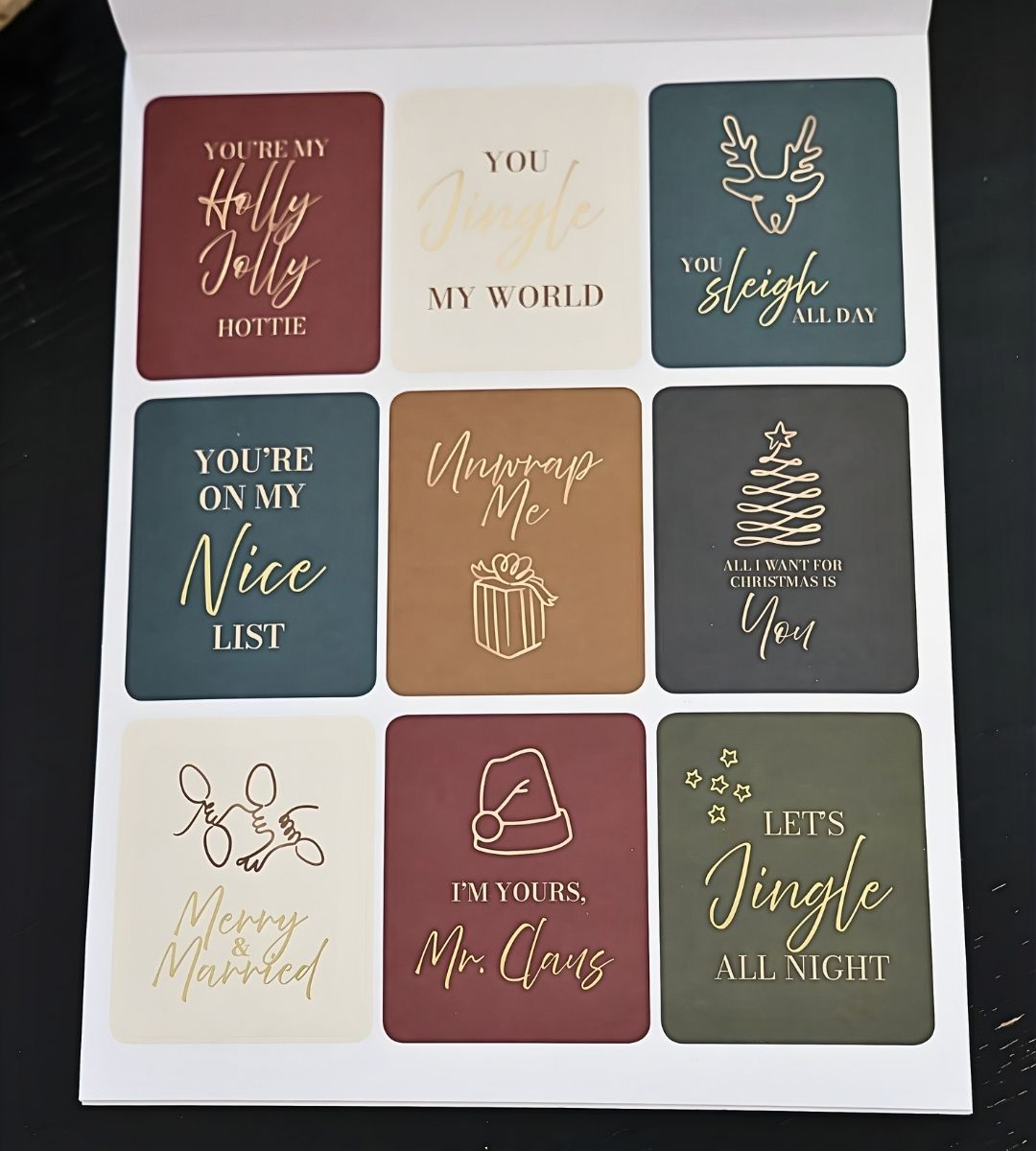 Christmas-themed affirmation stickers from the Honor Him Thru Holidays Affirmation Sticker Book featuring festive messages for Christian couples.