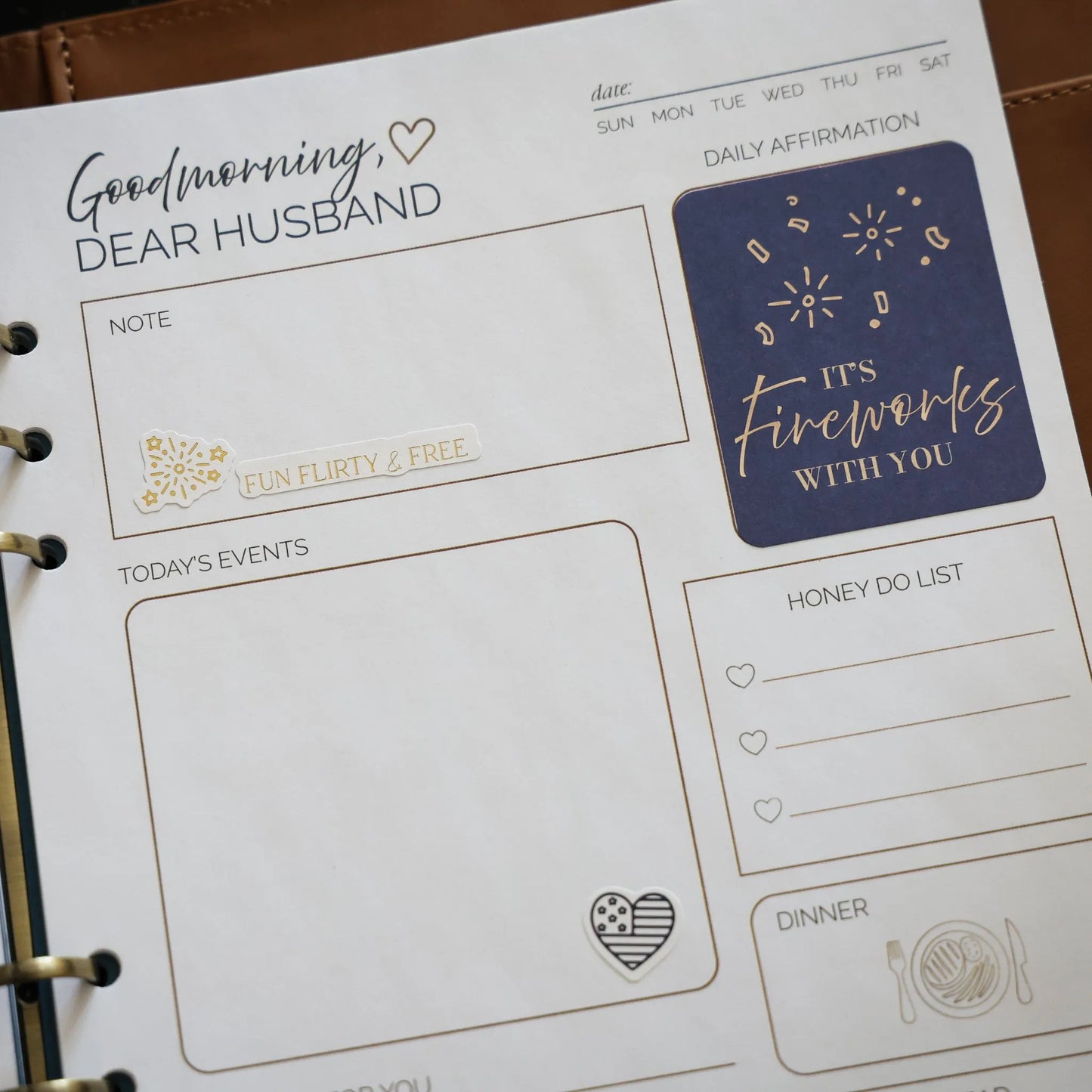 Fourth of July affirmation stickers from the Honor Him Thru Holidays Affirmation Sticker Book displayed inside the Honor Him Marriage Transformation System planner.