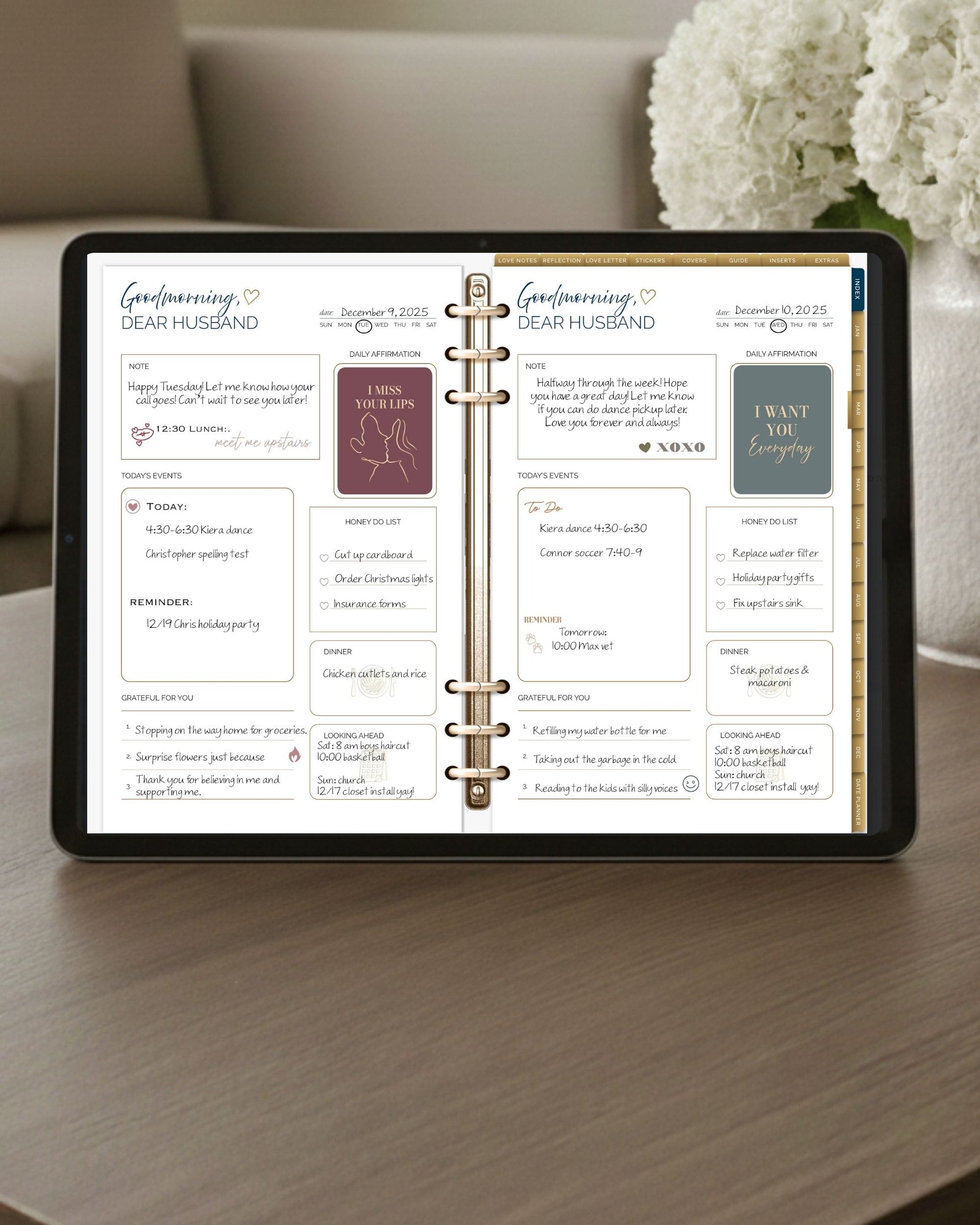 Digital planner displayed on a tablet featuring the Honor Him Thru Intimacy daily planner spread with affirmation stickers, love notes, daily schedules, meal planning, and gratitude prompts for married couples.