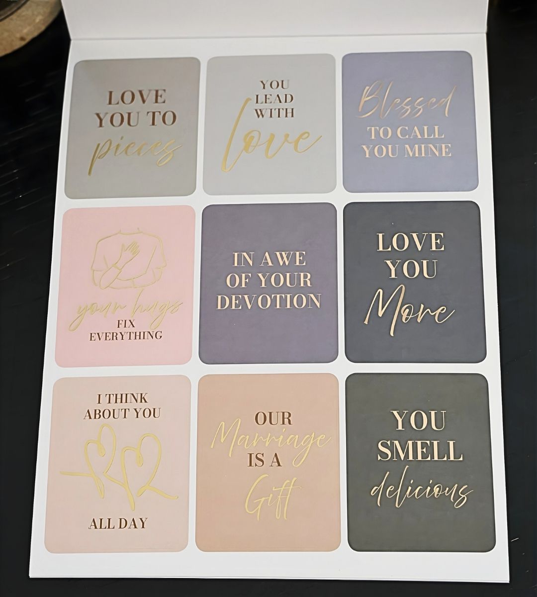 Gold foil affirmation stickers from the Honor Him Thru Words Affirmation Sticker Book featuring encouraging messages for husbands and Christian marriages.